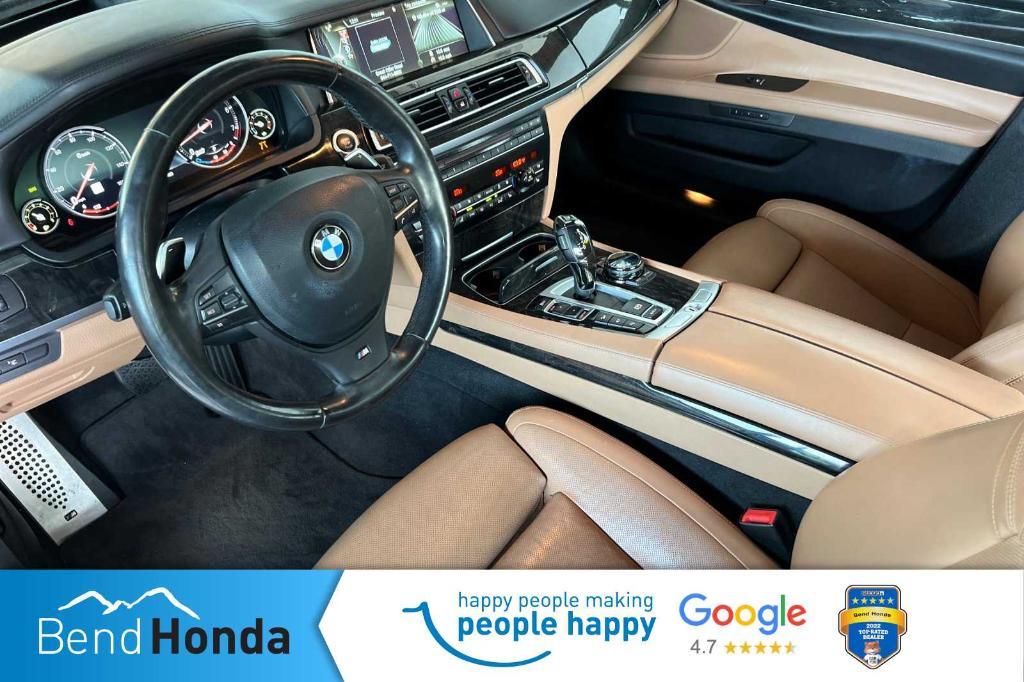 used 2014 BMW 750 car, priced at $13,990