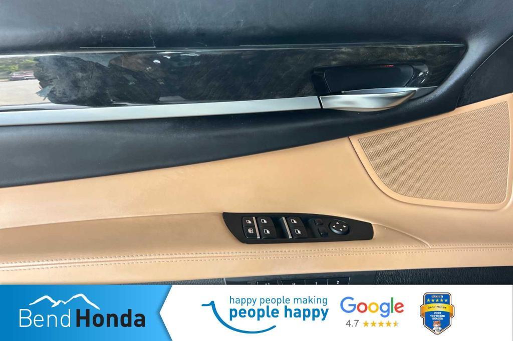 used 2014 BMW 750 car, priced at $13,990