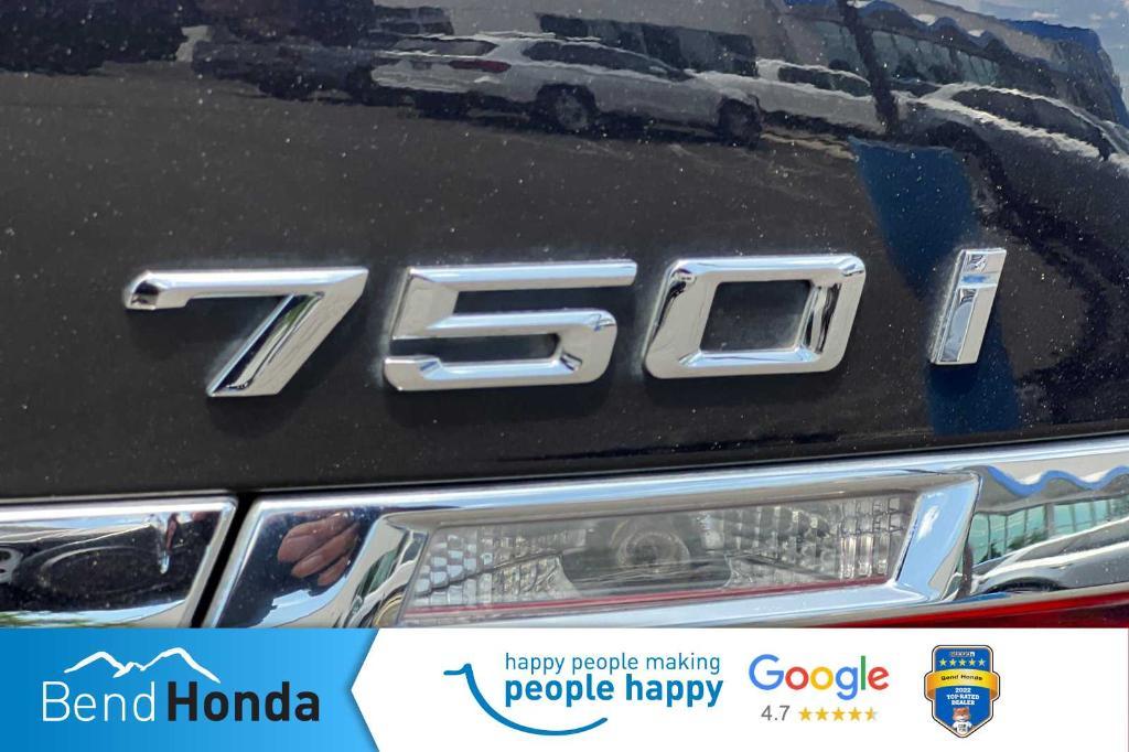 used 2014 BMW 750 car, priced at $13,990