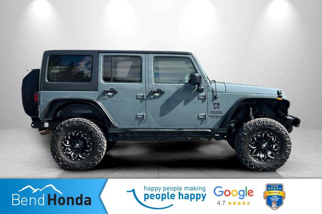 used 2015 Jeep Wrangler Unlimited car, priced at $20,990