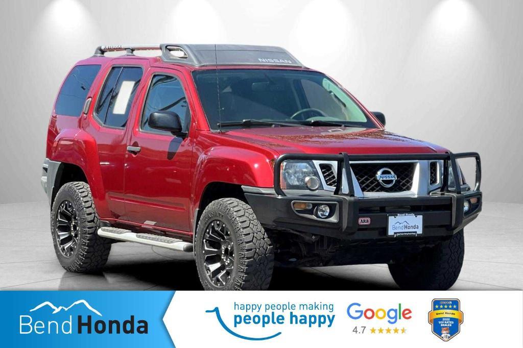 used 2014 Nissan Xterra car, priced at $21,496