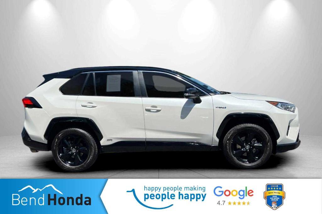 used 2019 Toyota RAV4 Hybrid car, priced at $23,996