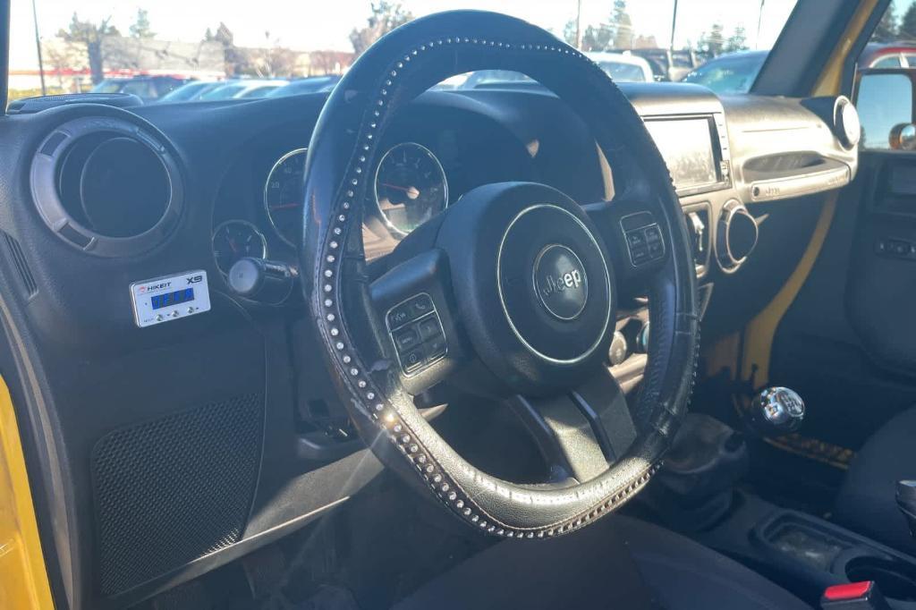 used 2015 Jeep Wrangler Unlimited car, priced at $18,496