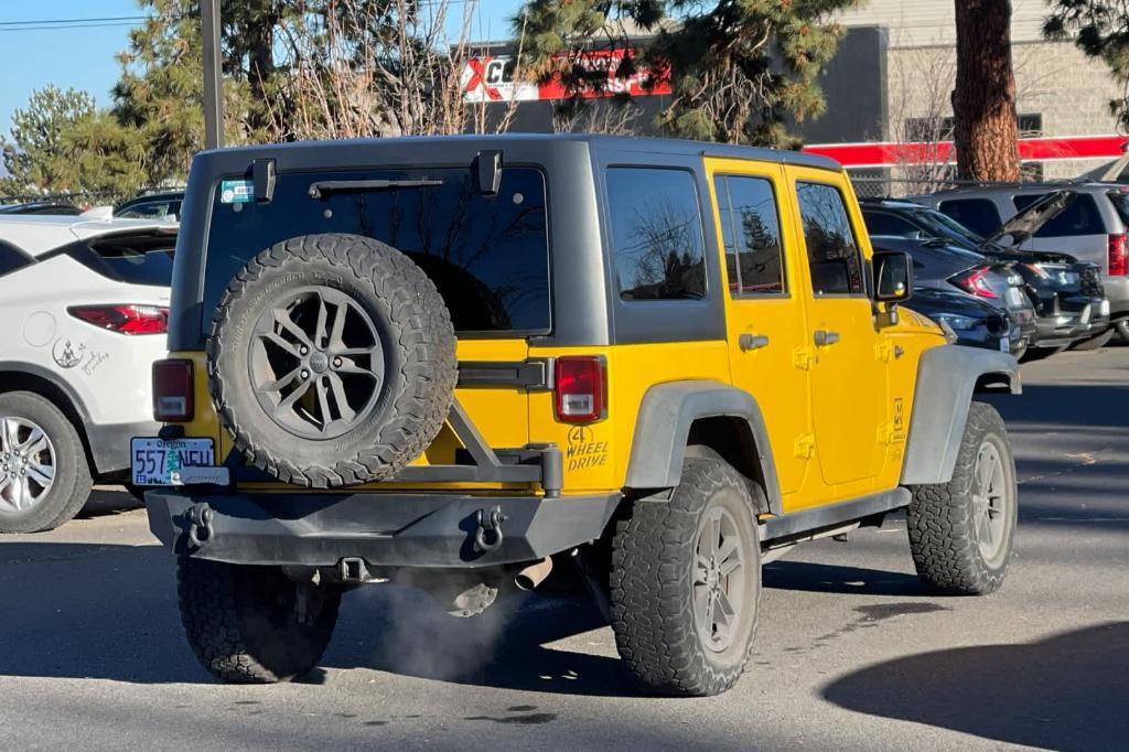 used 2015 Jeep Wrangler Unlimited car, priced at $18,496