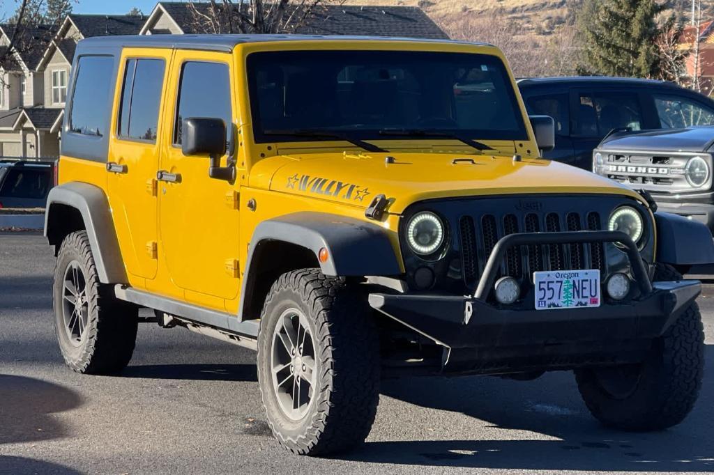 used 2015 Jeep Wrangler Unlimited car, priced at $18,496