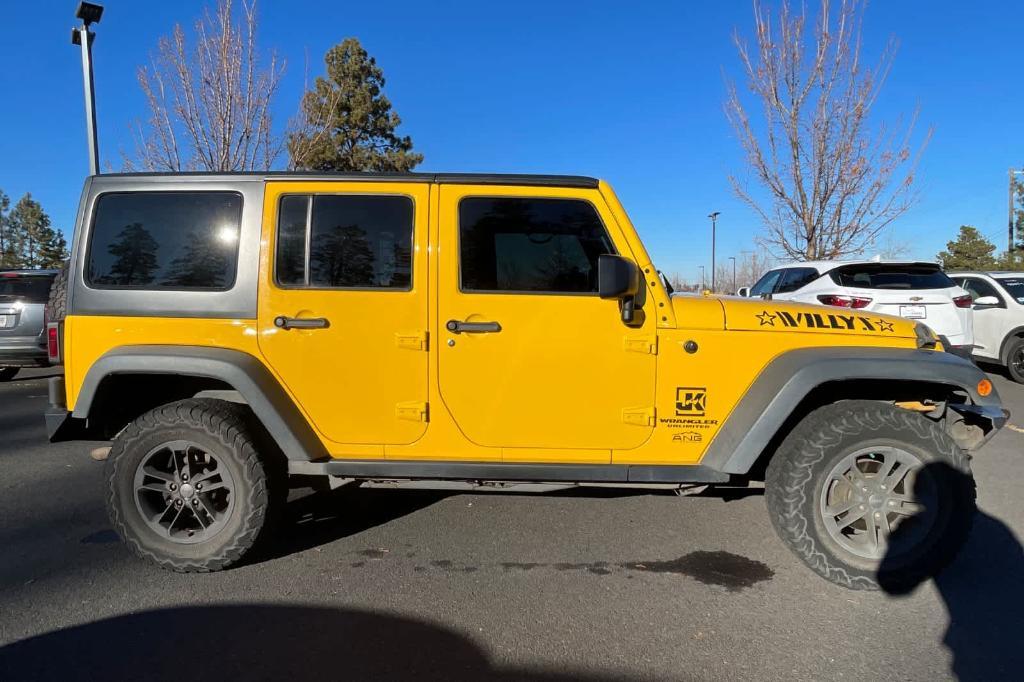 used 2015 Jeep Wrangler Unlimited car, priced at $18,496