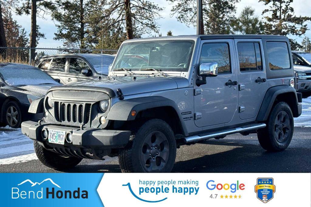 used 2014 Jeep Wrangler Unlimited car, priced at $21,990