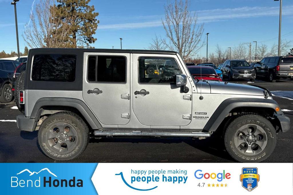 used 2014 Jeep Wrangler Unlimited car, priced at $21,990