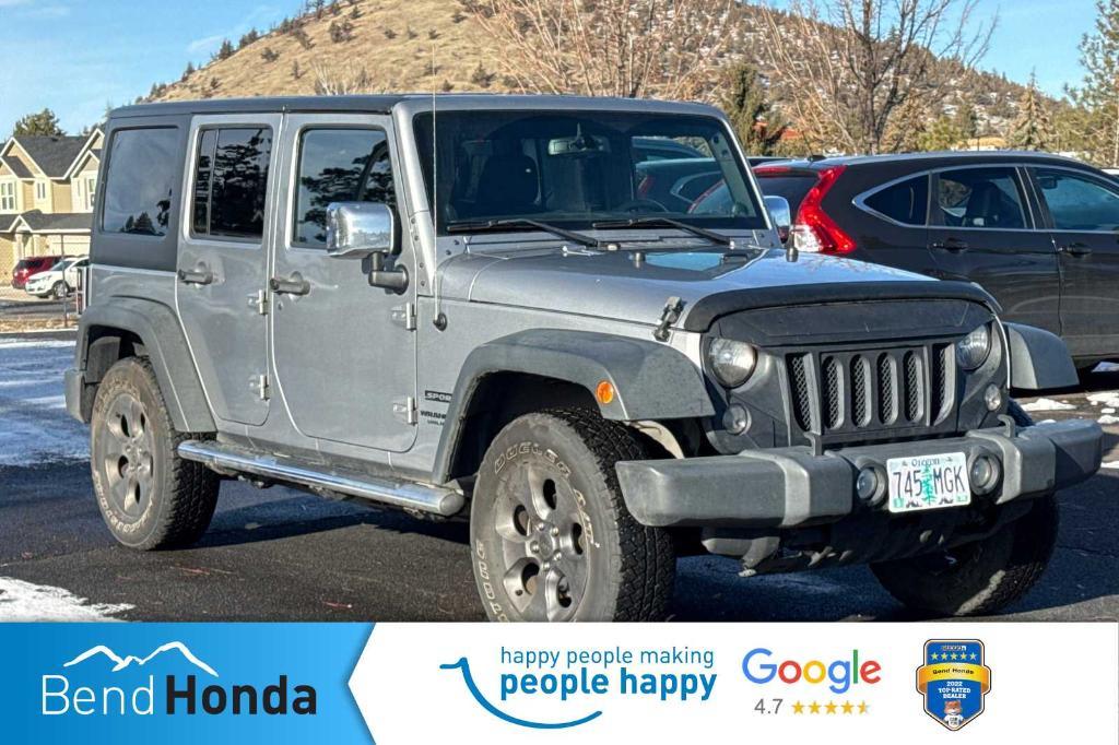 used 2014 Jeep Wrangler Unlimited car, priced at $21,990