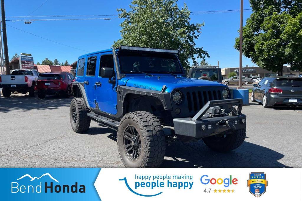 used 2015 Jeep Wrangler Unlimited car, priced at $19,990