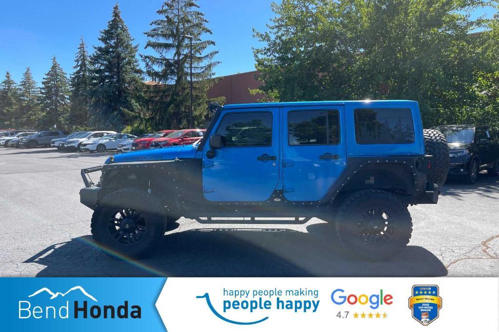 used 2015 Jeep Wrangler Unlimited car, priced at $19,990
