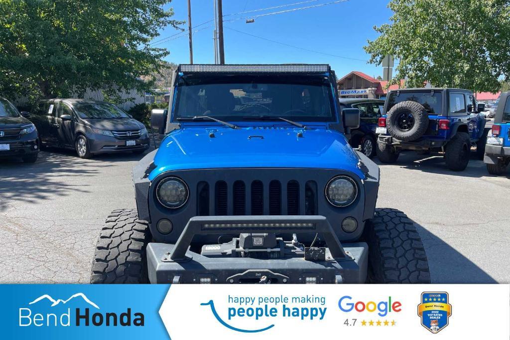 used 2015 Jeep Wrangler Unlimited car, priced at $19,990