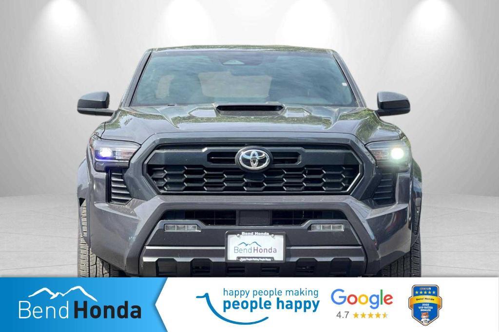 used 2024 Toyota Tacoma car, priced at $40,996