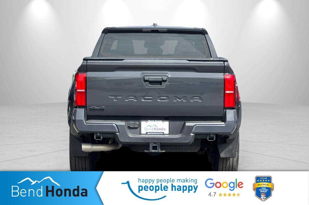 used 2024 Toyota Tacoma car, priced at $40,996