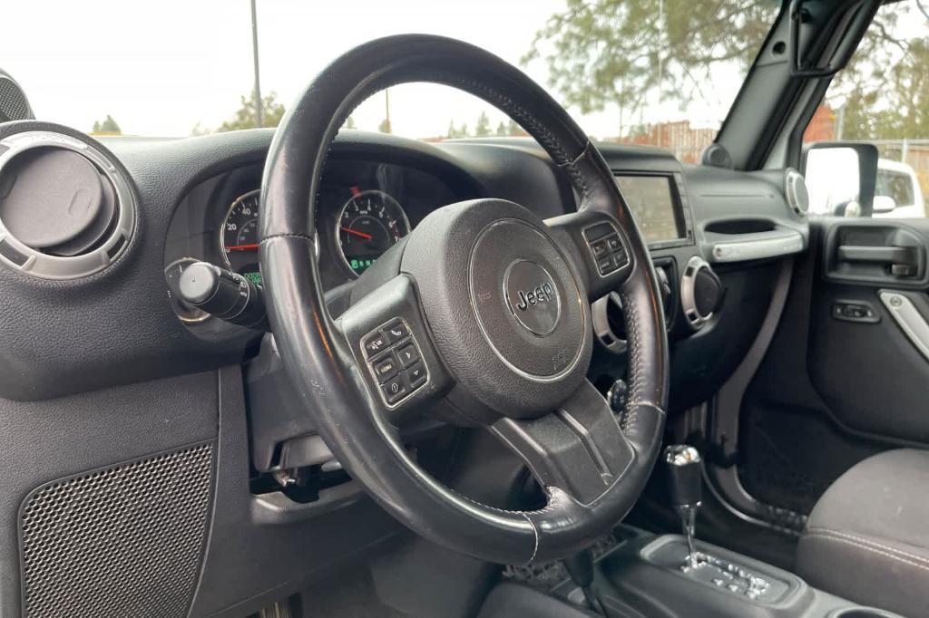 used 2014 Jeep Wrangler Unlimited car, priced at $16,990