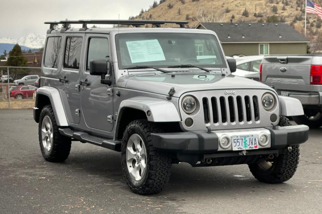 used 2014 Jeep Wrangler Unlimited car, priced at $16,990