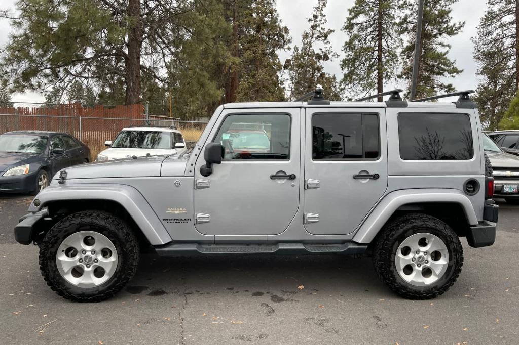 used 2014 Jeep Wrangler Unlimited car, priced at $16,990