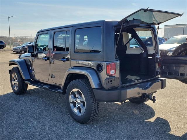 used 2018 Jeep Wrangler JK Unlimited car, priced at $22,359