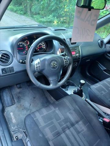 used 2012 Suzuki SX4 car, priced at $3,995