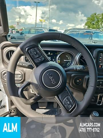 used 2023 Jeep Wrangler 4xe car, priced at $33,920