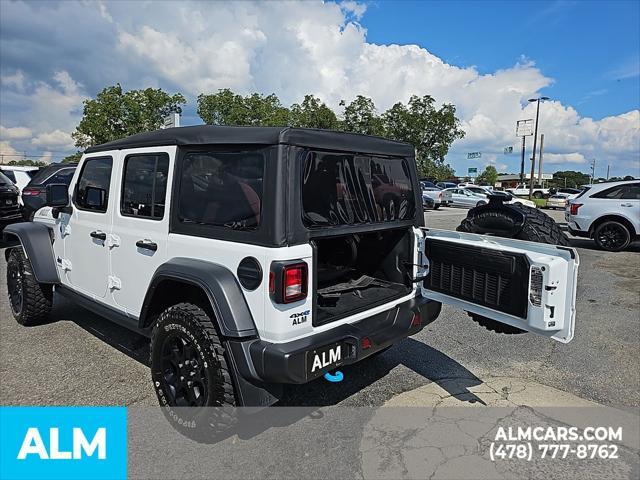 used 2023 Jeep Wrangler 4xe car, priced at $33,920