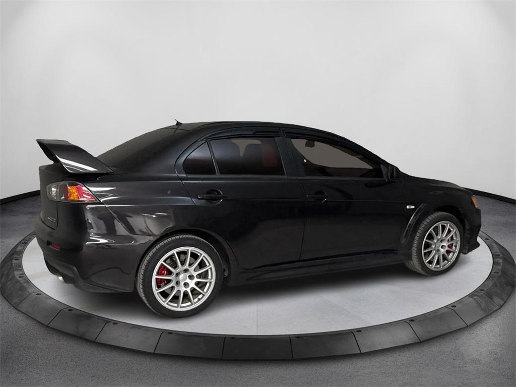 used 2013 Mitsubishi Lancer Evolution car, priced at $25,991