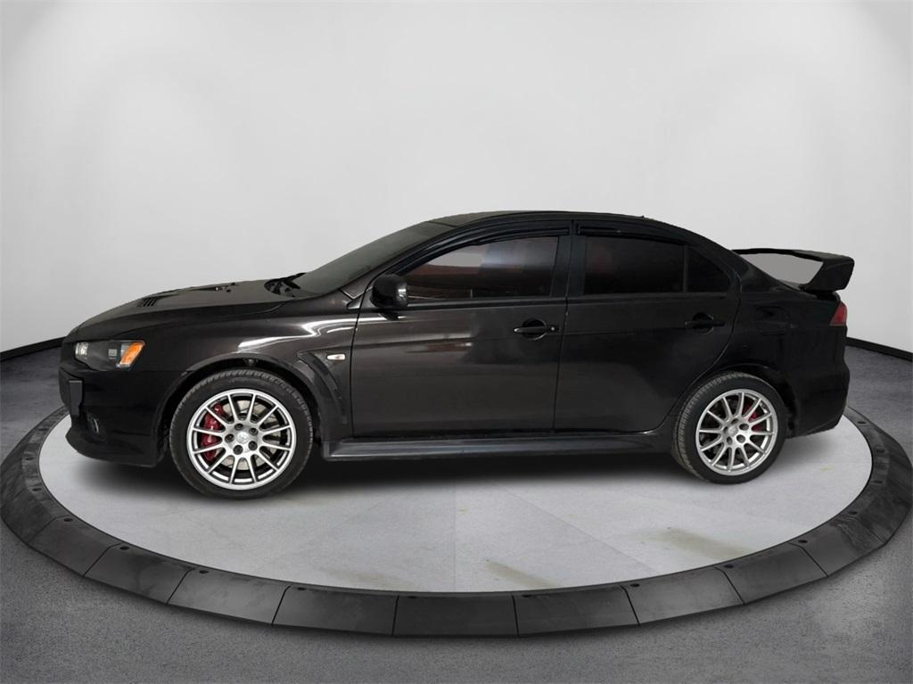 used 2013 Mitsubishi Lancer Evolution car, priced at $25,991