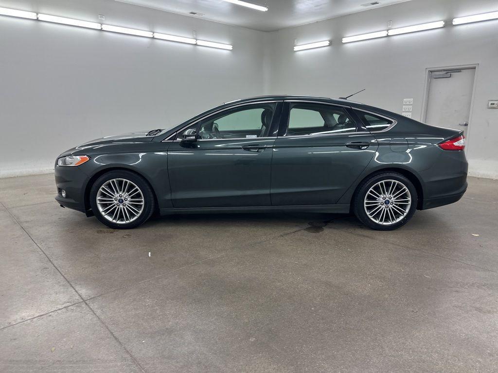 used 2015 Ford Fusion car, priced at $5,299