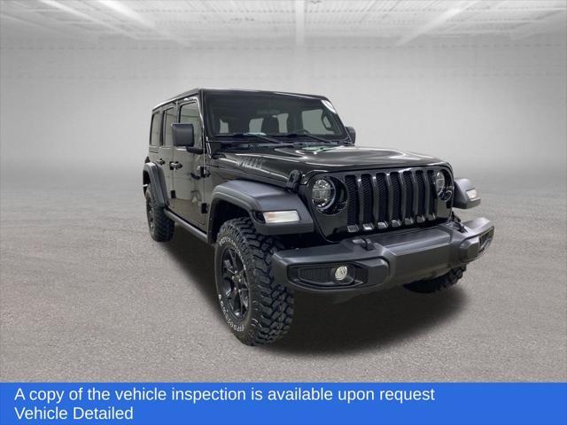 used 2022 Jeep Wrangler car, priced at $33,499