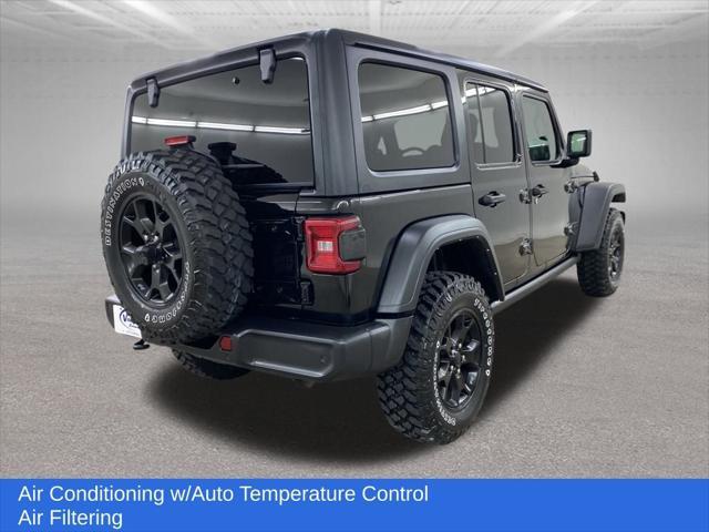 used 2022 Jeep Wrangler car, priced at $33,499