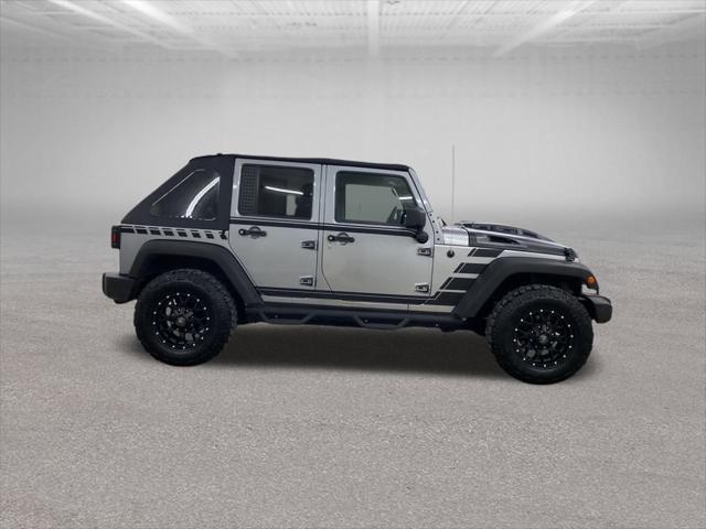 used 2014 Jeep Wrangler Unlimited car, priced at $14,999