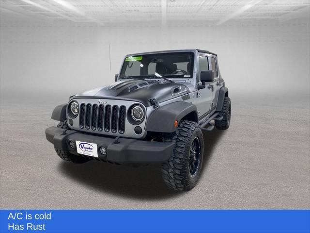 used 2014 Jeep Wrangler Unlimited car, priced at $14,999