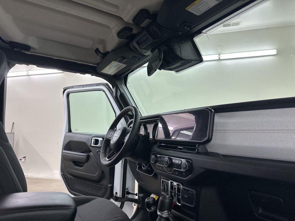 used 2024 Jeep Wrangler car, priced at $35,299