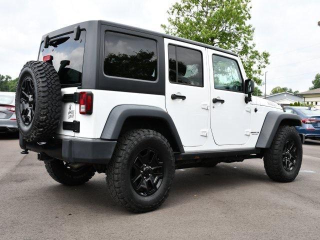 used 2017 Jeep Wrangler Unlimited car, priced at $19,844