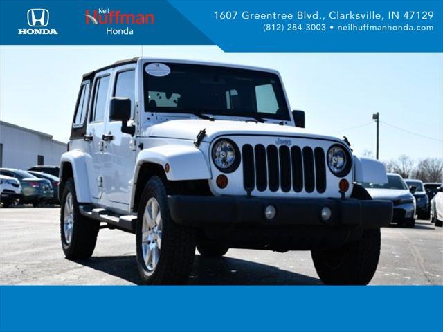 used 2012 Jeep Wrangler Unlimited car, priced at $13,388