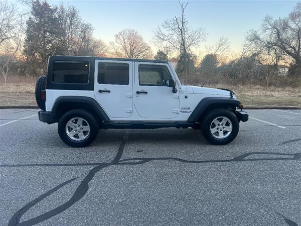 used 2014 Jeep Wrangler Unlimited car, priced at $15,900