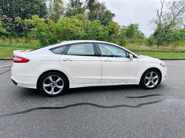 used 2015 Ford Fusion car, priced at $5,995