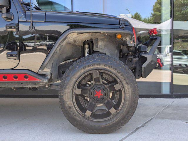 used 2016 Jeep Wrangler Unlimited car, priced at $24,991
