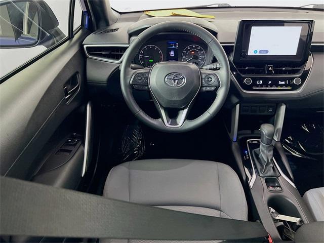 used 2024 Toyota Corolla Cross Hybrid car, priced at $26,521