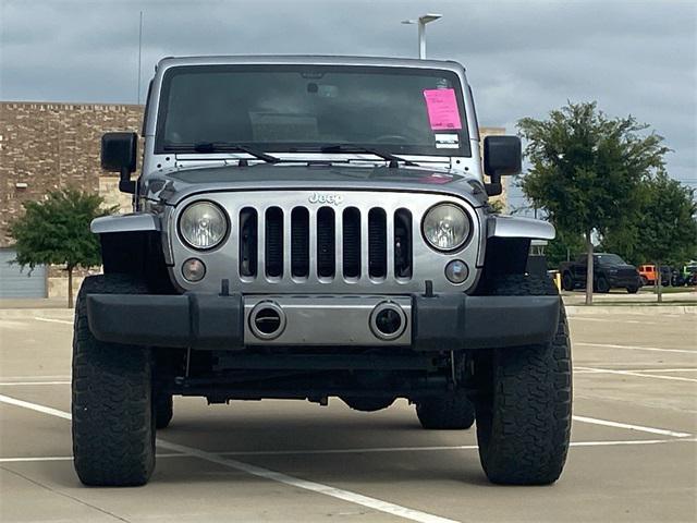 used 2014 Jeep Wrangler Unlimited car, priced at $16,842