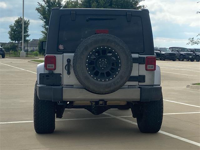 used 2014 Jeep Wrangler Unlimited car, priced at $16,842