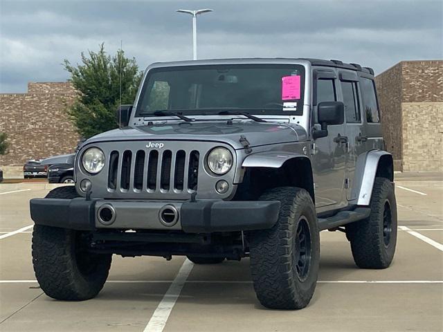used 2014 Jeep Wrangler Unlimited car, priced at $16,842