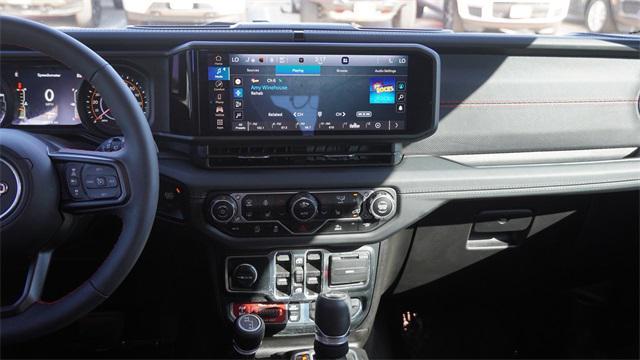 used 2024 Jeep Wrangler car, priced at $45,588