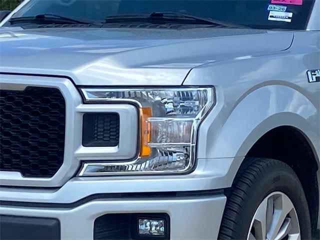 used 2018 Ford F-150 car, priced at $23,176