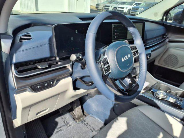 new 2025 Kia Carnival Hybrid car, priced at $51,470