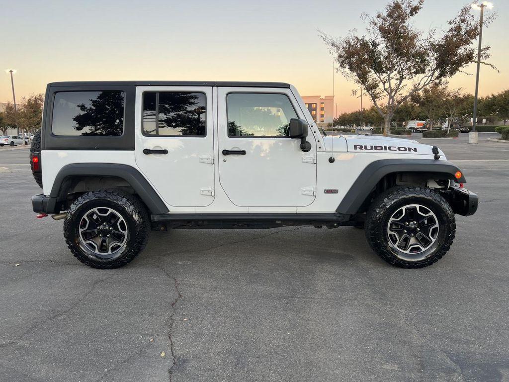 used 2013 Jeep Wrangler Unlimited car, priced at $21,998