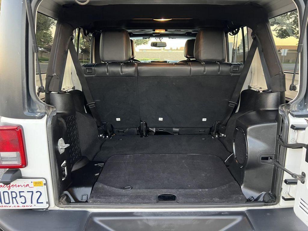 used 2013 Jeep Wrangler Unlimited car, priced at $21,998