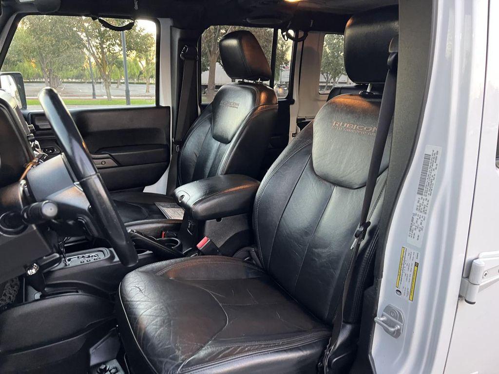 used 2013 Jeep Wrangler Unlimited car, priced at $21,998