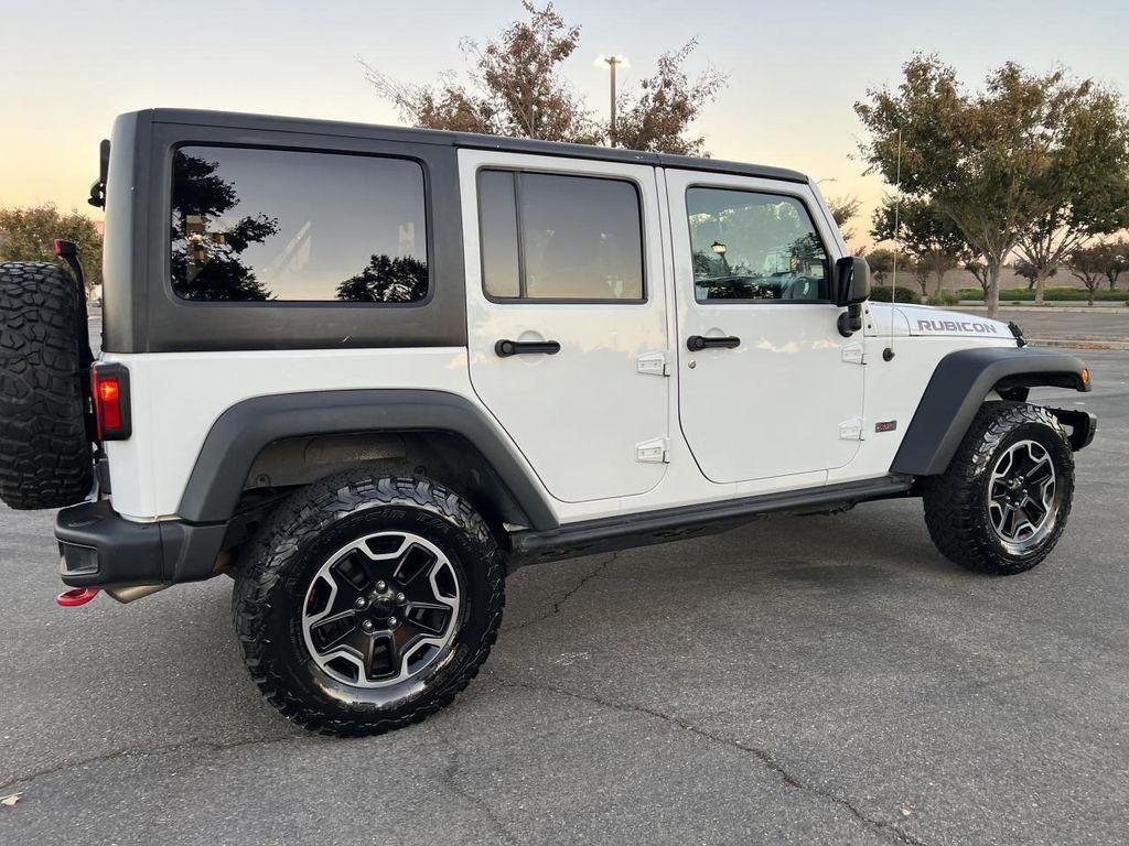 used 2013 Jeep Wrangler Unlimited car, priced at $21,998
