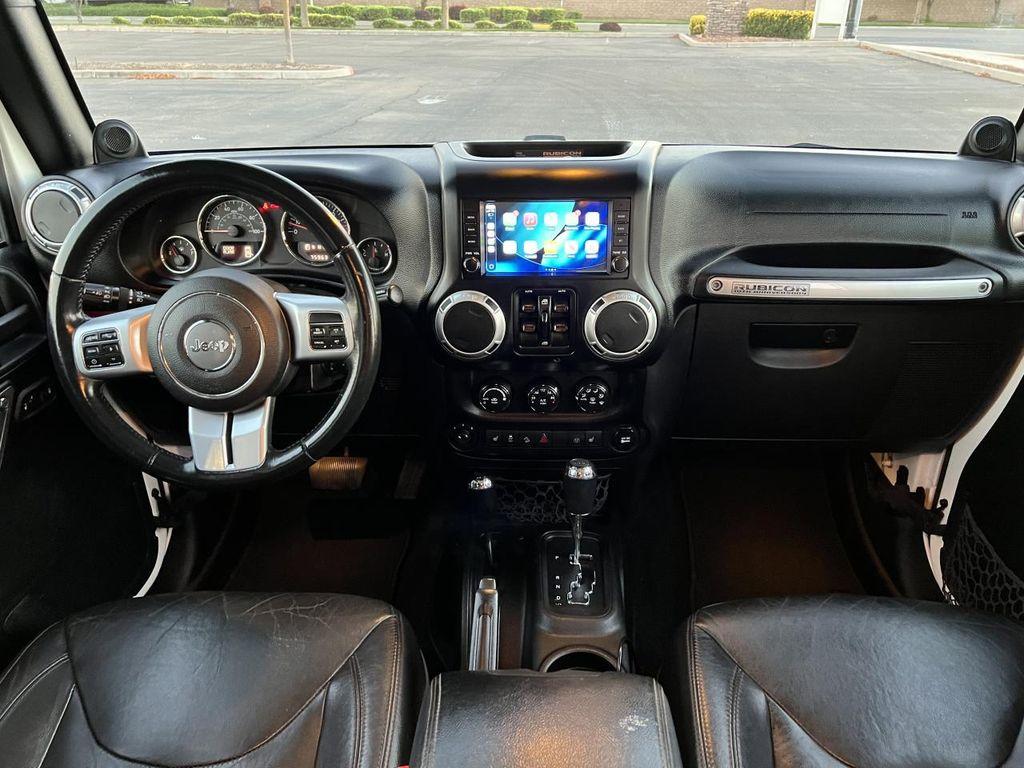 used 2013 Jeep Wrangler Unlimited car, priced at $21,998